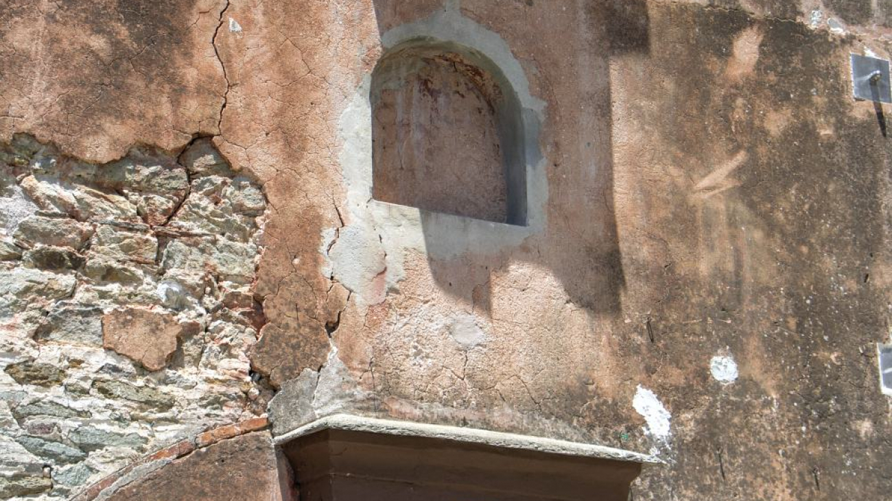 The entrance of the Monastery with the Apostles patrons of the Monastery.