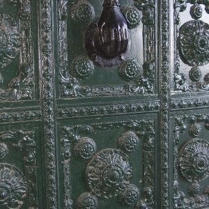 An ornate metal door.