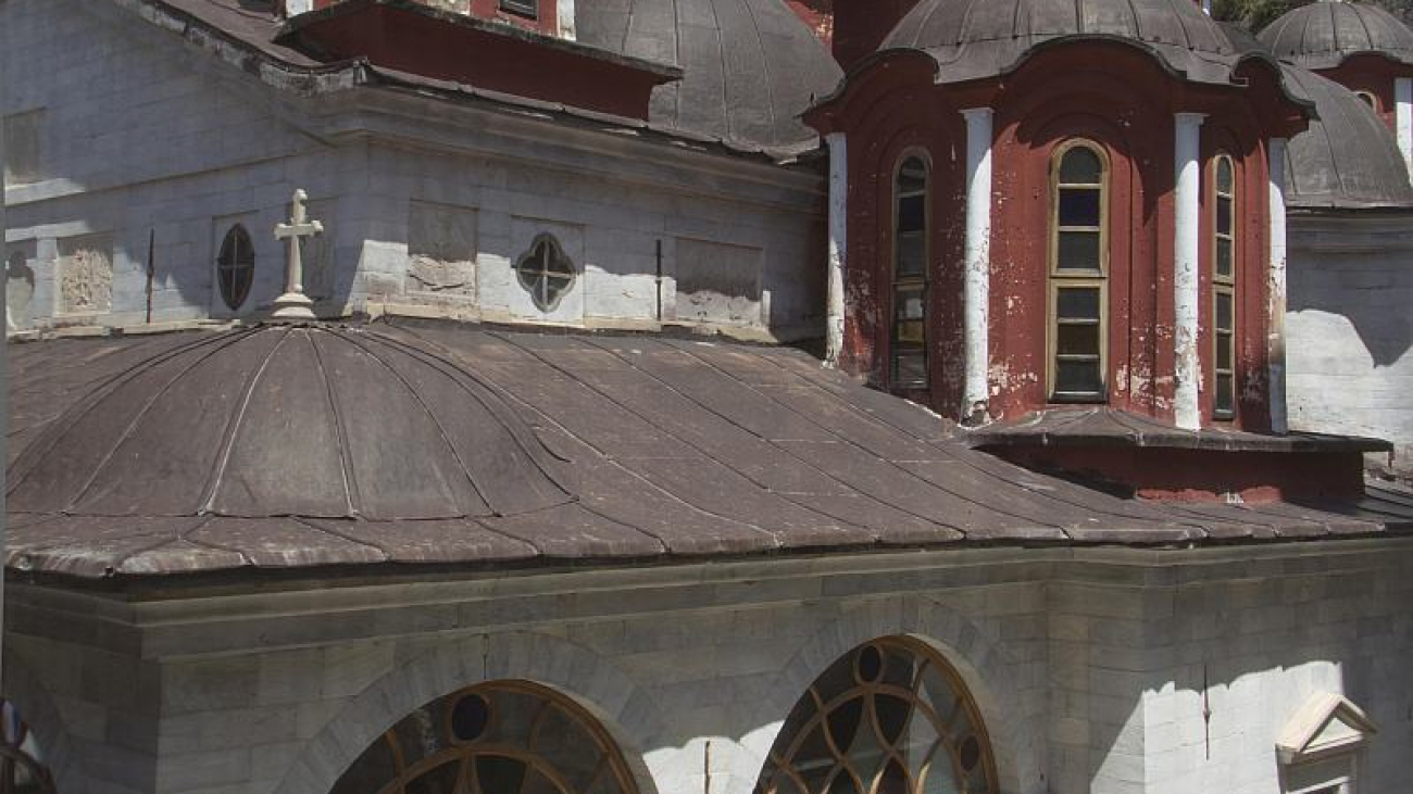 The cathedral of the Monastery. A section of the fortification wall is visible.