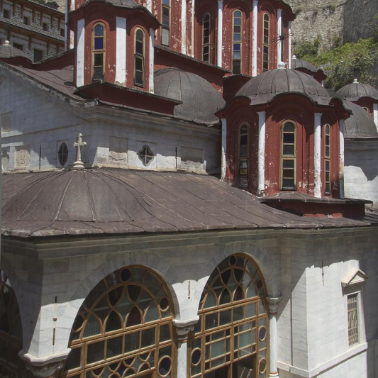 The cathedral of the Monastery. A section of the fortification wall is visible.