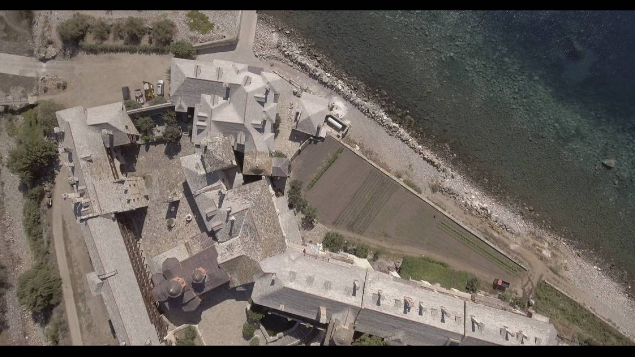 The uniform height of the buildings and the walls of the Monastery.