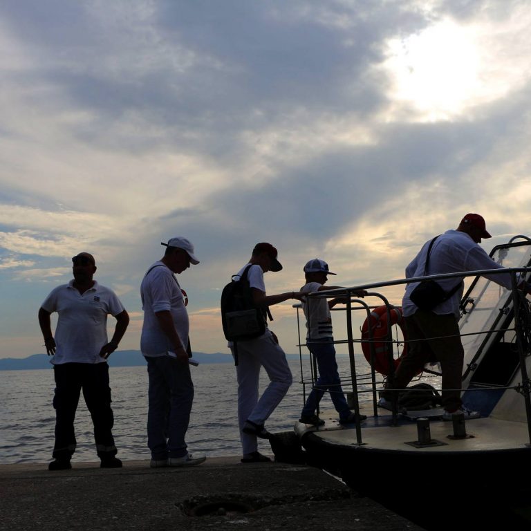 Pilgrims in the 'Arsenas' (shipyard) of the Monastery use the speedboat of the ferryline, that connects it to Ouranopolis and the other Monasteries.